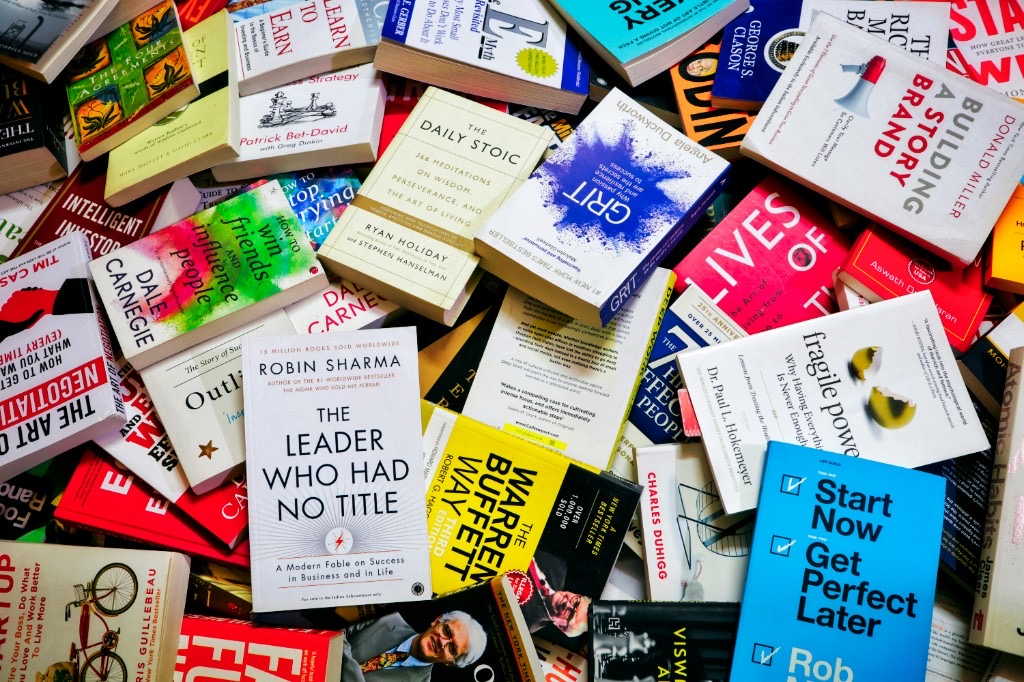 Overhead view of a colorful collection of business and self-development books